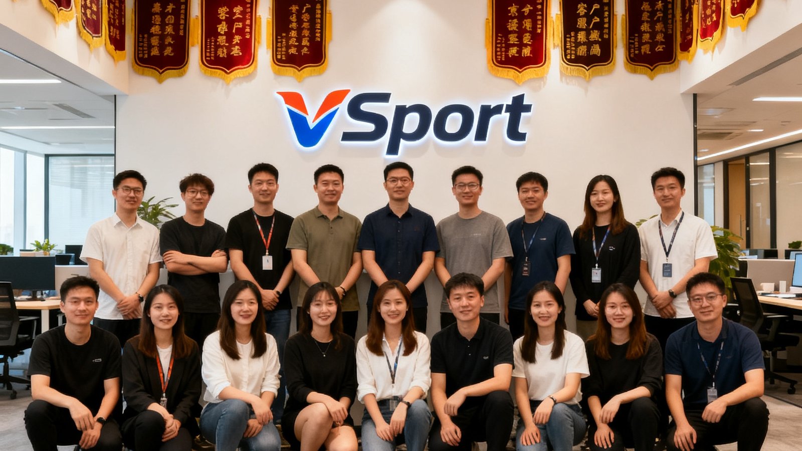 VSport上海总部办公室内30名团队成员的合影，背景墙上挂着公司logo和客户感谢锦旗，每个人脸上洋溢着活力与自信